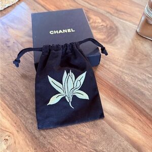 CHANEL Black Pouch with Floral Embroidery